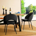 Gesteppter Esszimmerstuhl aus PU-Leder im Mid-Century-Modern-Stil mit schwarzen Metallbeinen