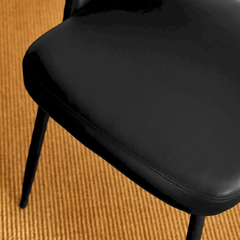 Gesteppter Esszimmerstuhl aus PU-Leder im Mid-Century-Modern-Stil mit schwarzen Metallbeinen